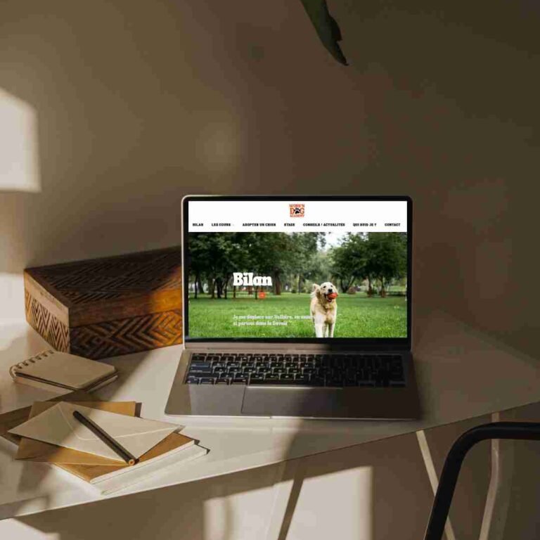 Site internet Work n Dog présenté sur ordinateur portable, création par Maud Communication